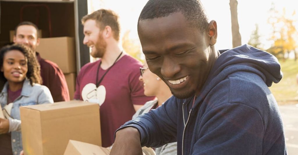 Man helping carrying boxes