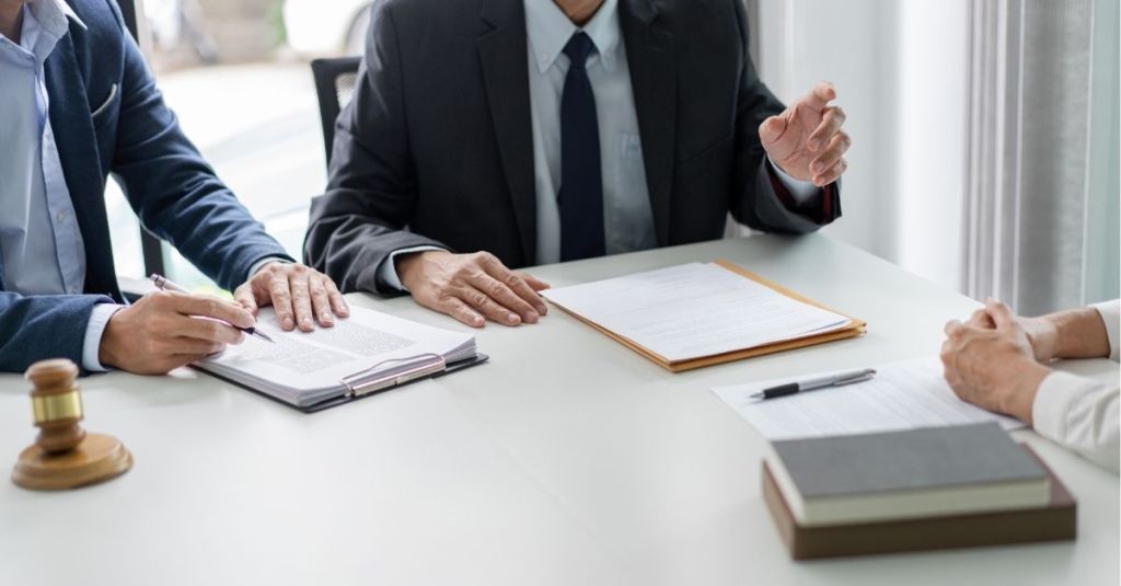 Group of people talking at a table