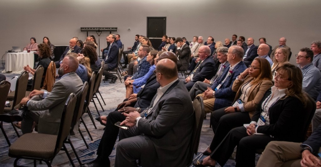 Room full of attendees at the Annual Business Meeting 2025