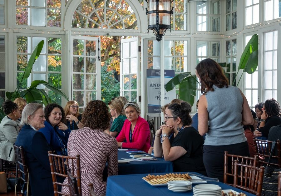 Group of women sitting in the Tea Room at the Big I NY Women in Insurance 2026.