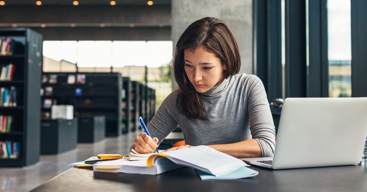Woman studying in library