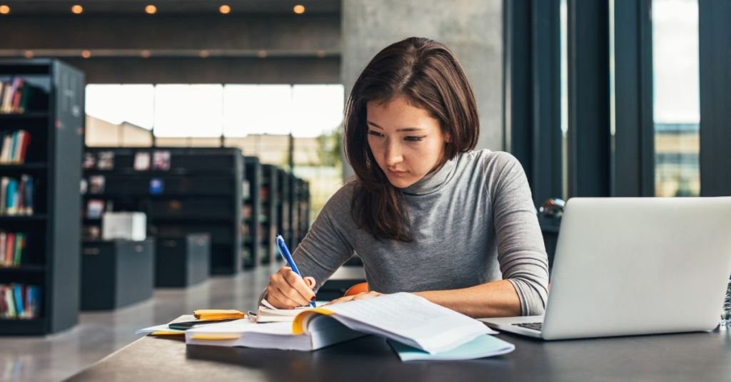 Woman studying in library