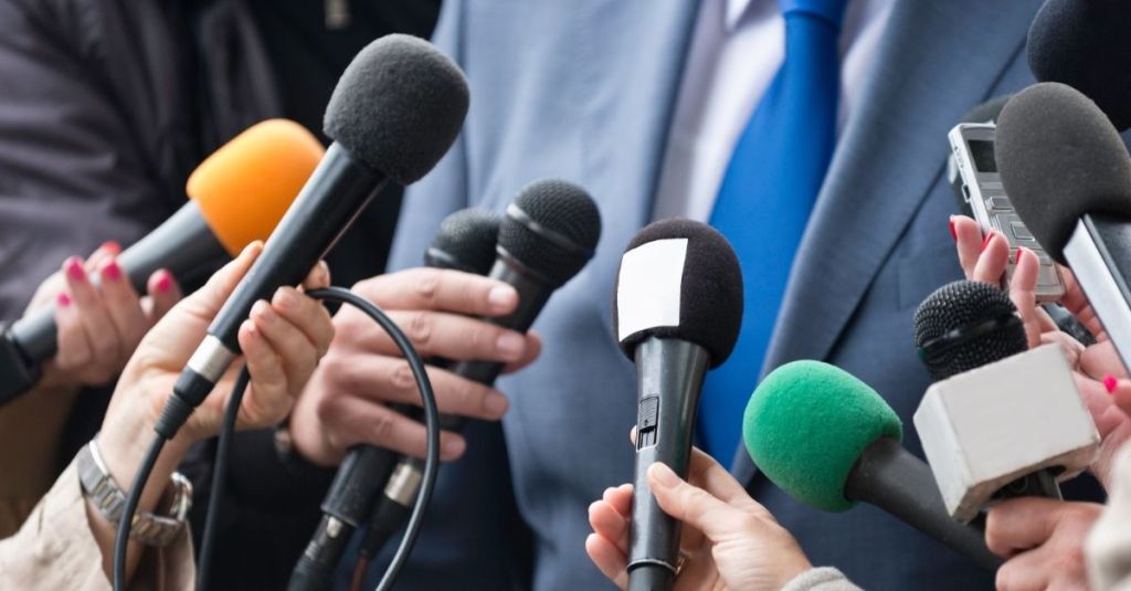 Microphones facing a person