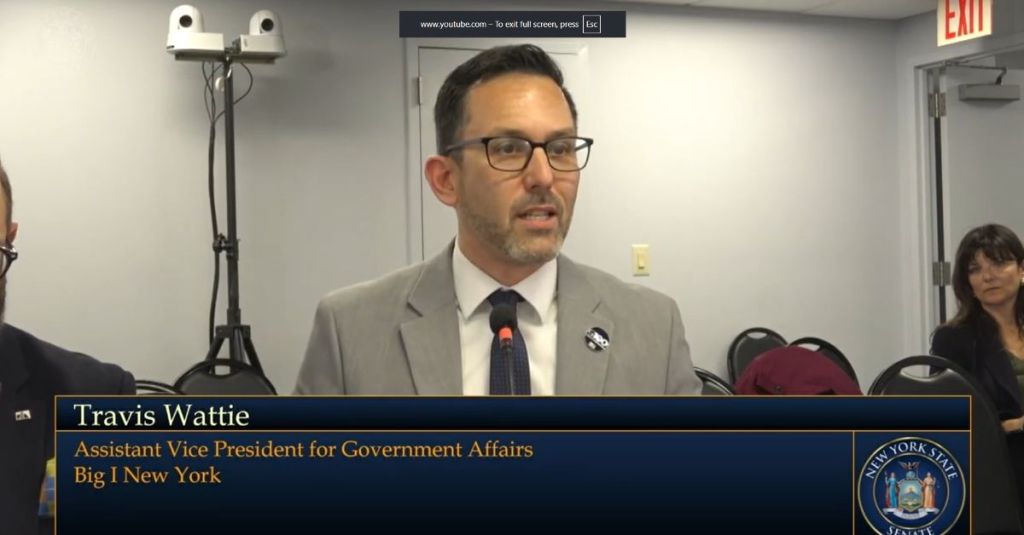 Travis Wattie speaking at the New York State Senate Joint Public Hearing