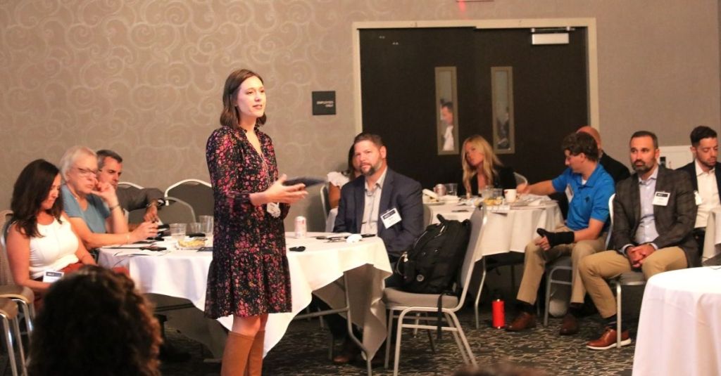 Ashley Engl speaking at the Local Leaders Summit 2025