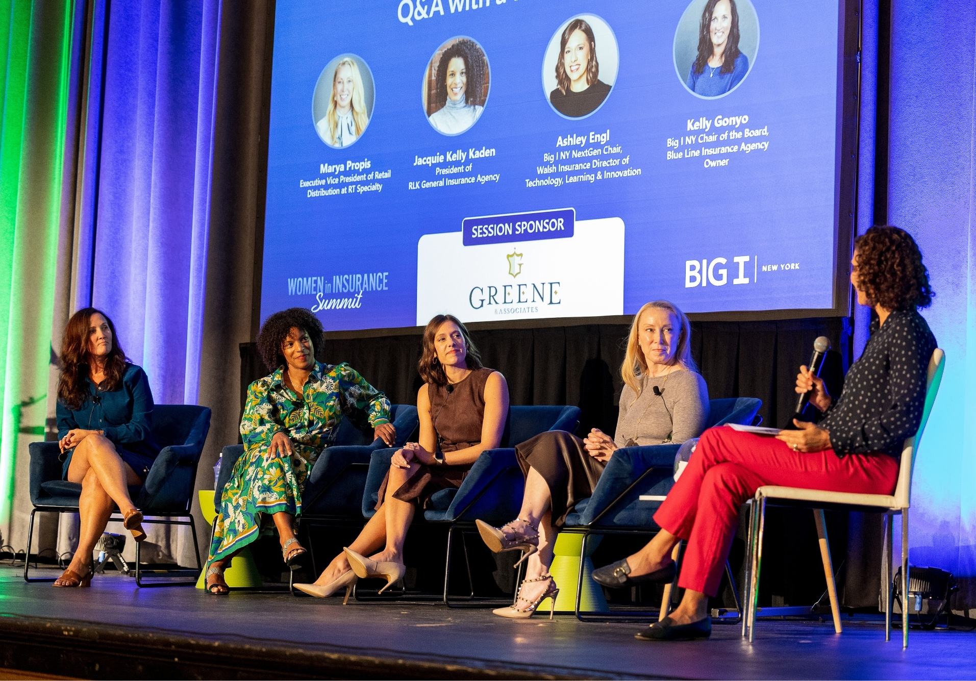 Stage view of panelists at the Women in Insurance Summit 2025
