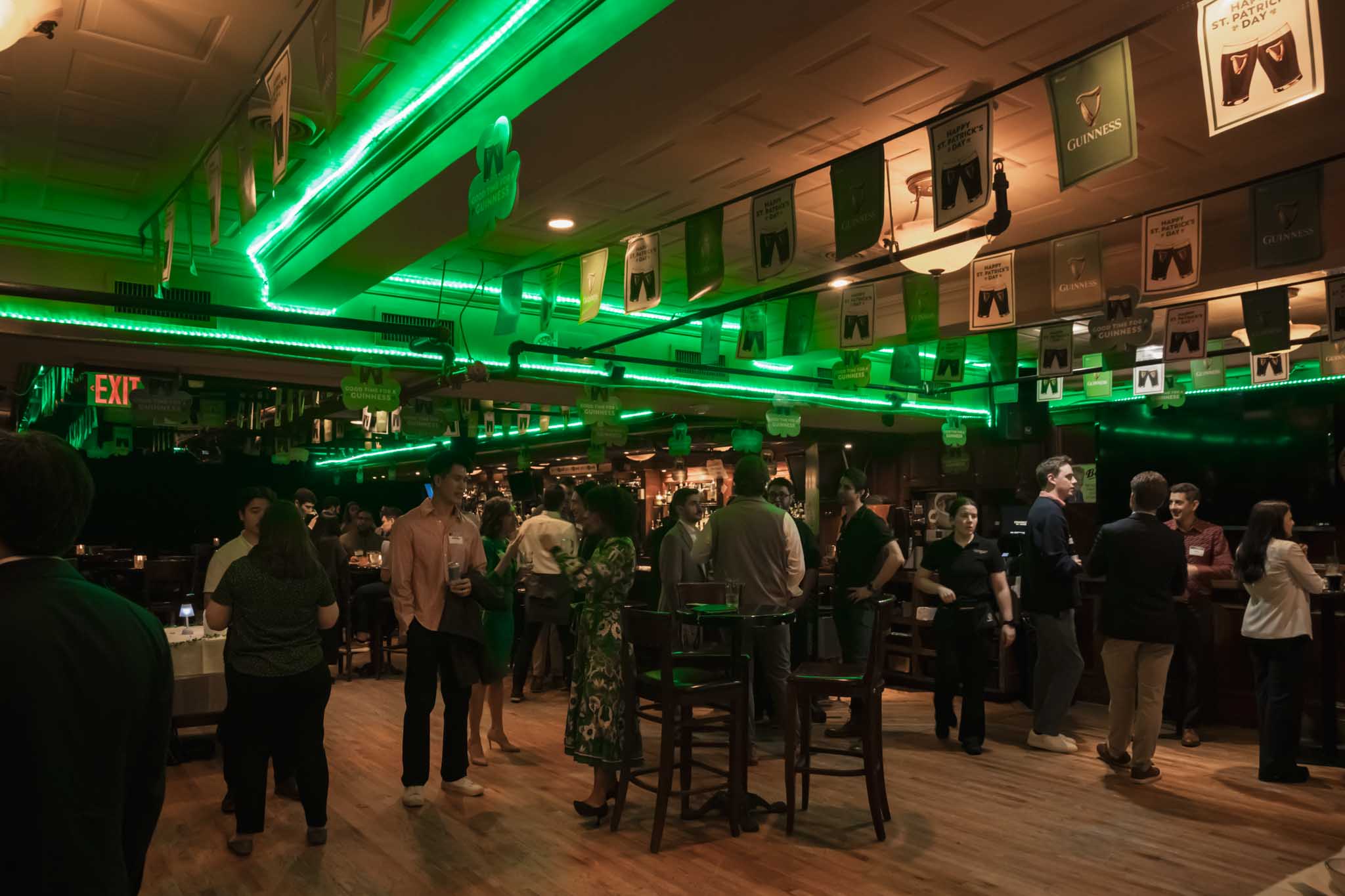 Wide shot view of the crowd of people at the NextGen NYC Shamrock Social.