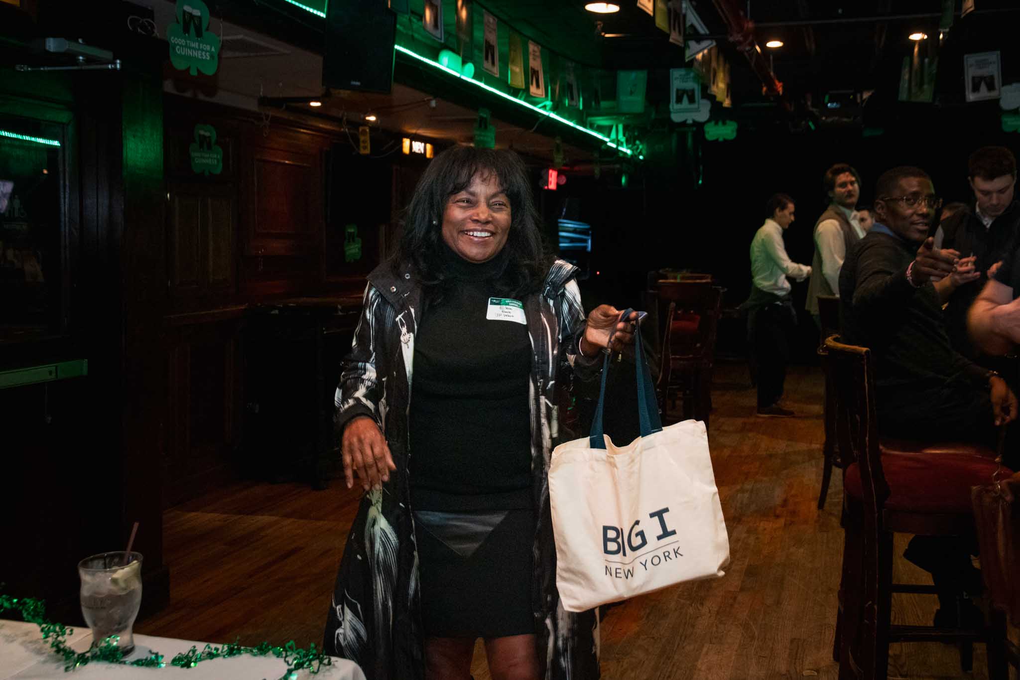 Elieen Frank (JP West) winning the swag bag at the NextGen NYC Shamrock Social.