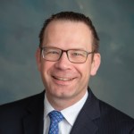 Headshot of R. Benedikt Sander.